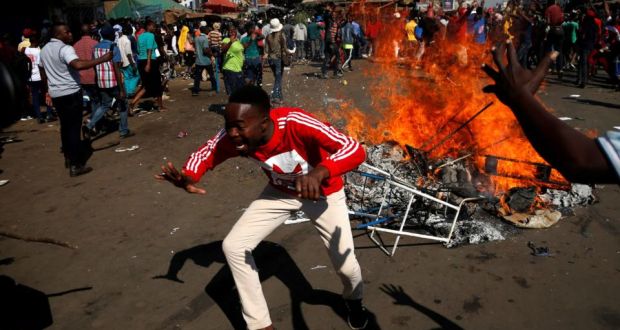 One person shot dead as army clashes with opposition supporters in Zimbabwe